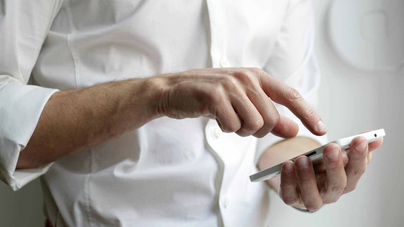 A phone in hand, the kind of place automated confirmations land